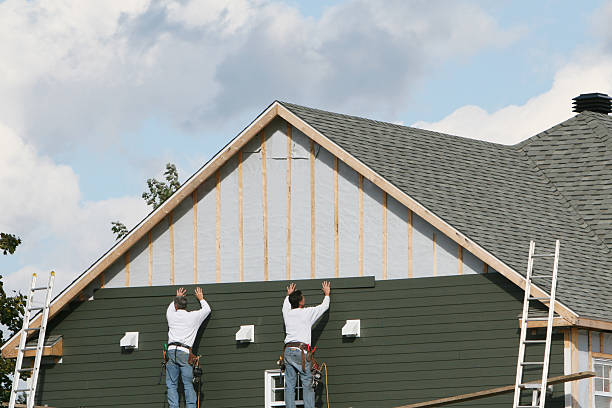 Professional Vinyl Siding technician working in Newport, WA